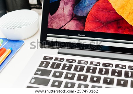 PARIS, FRANCE - MAR 10, 2015: Apple Computers website on MacBook Retina in room environment showcasing new MacBook Retina display as seen on 10 March, 2015