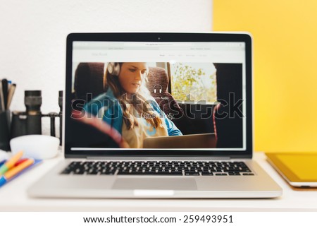 PARIS, FRANCE - MAR 10, 2015: Apple Computers website on MacBook Retina in room environment showcasing Bluetooth Audioon new MacBook as seen on 10 March, 2015