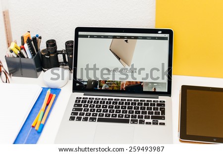 PARIS, FRANCE - MAR 10, 2015: Apple Computers website on MacBook Retina in room environment showcasing new MacBook ultrathin laptop as seen on 10 March, 2015