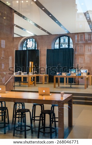 STRASBOURG, FRANCE - APR 09, 2014: Apple Store with working and covered shopping windows with black fabric curtains to protect the store rearrangement for the Apple Watch launch.
