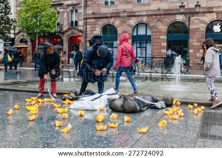 STRASBOURG, FRANCE - APR 26 2015 Arranging Frontex line over dead corps protest against immigration policy and border management which asks for commitment in the wake of migrants boat disasters