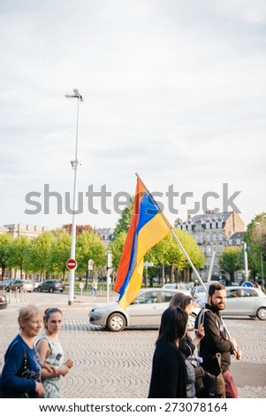 STRASBOURG, FRANCE - APRIL 24, 2015: Armenian protesters march for 100th remembrance year of Armenian genocide in 1915 as part of \'Armenian Genocide Remembrance Day\'