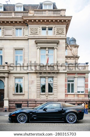 STRASBOURG, FRANCE - MAY 16, 2015: Chevrolet Corvette ZR 1 luxury sport car parked in front of historic building hotel. Between 2008-2014 only 4,684 were produced.