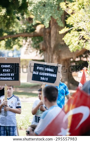 STRASBOURG, FRANCE - JULY 11, 2015: Nobel Prize for Execution to China in 2015 - Uyghur human rights activists participate in a demonstration to protest against Chinese government\'s policy in Uyghur