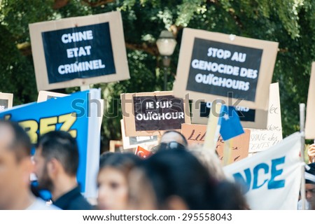 STRASBOURG, FRANCE - JULY 11, 2015: Je suis ouighour - Uyghur human rights activists participate in a demonstration to protest against Chinese government\'s policy in Uyghur