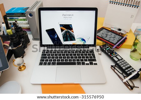 PARIS, FRANCE - SEP 10, 2015: Apple Computers website on MacBook Pro Retina in a creative room environment showcasing the newly announced iPad mini 4