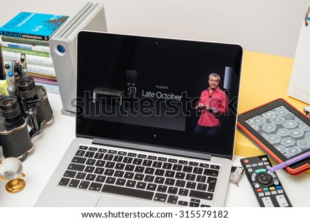 PARIS, FRANCE - SEP 10, 2015: Apple Computers website on MacBook Pro Retina in a creative room environment showcasing the newly announced Apple TV