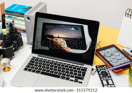 PARIS, FRANCE - SEP 10, 2015: Apple Computers website on MacBook Pro Retina in a creative room environment showcasing the newly announced iPad Pro