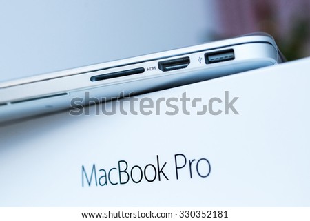 PARIS, FRANCE - JANUARY 14, 2015: New Apple MacBook Pro laptop with retina display and force touch  during the unboxing