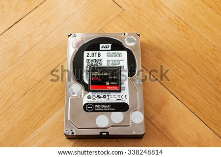 LONDON, UNITED KINGDOM - NOV 5, 2015: Western Digital HDD with SanDisk Ultra fast Compact Flash CF Card. Western Digital WD had agreed to acquire flash-memory supplier SanDisk for about $19 billion