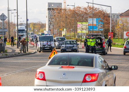 STRASBOURG, FRANCE - NOV 14 2015: French Police checking vehicles on the \'Bridge of Europe\' between Strasbourg and Kehl Germany, as a security measure in the wake of attacks in Paris