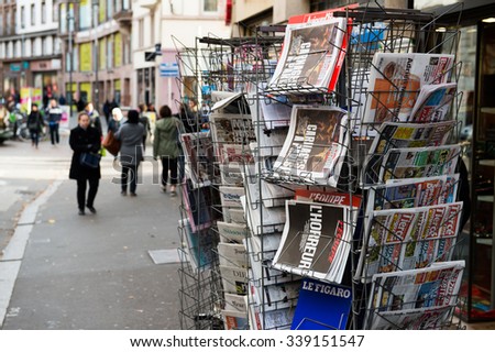 STRASBOURG, FRANCE - 14 NOV, 2015: The front covers of International newspapers display headlining the terrorist attacks yesterday in Paris