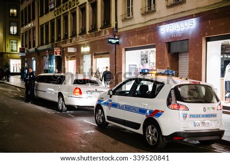 STRASBOURG, FRANCE - 14 NOV 2015: Police officers inspecting a limousine in Strasbourg after the November 13 attacks in Paris that killed at least 128 people