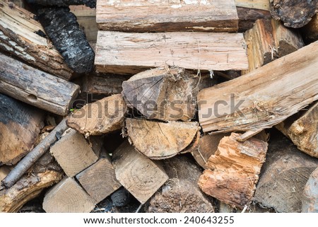 a pile of different shape and size of firewood