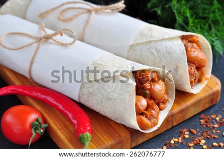 Burrito with minced meat and red beans