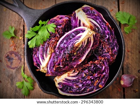 organic red cabbage baked in olive oil with chili pepper flakes and sea salt. vegetarian food.  image is tinted
