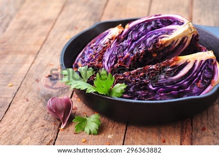 organic red cabbage baked in olive oil with chili pepper flakes and sea salt. vegetarian food.
