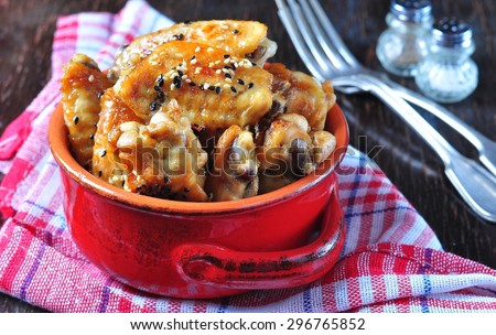 baked chicken wings in soy sauce with sesame seeds