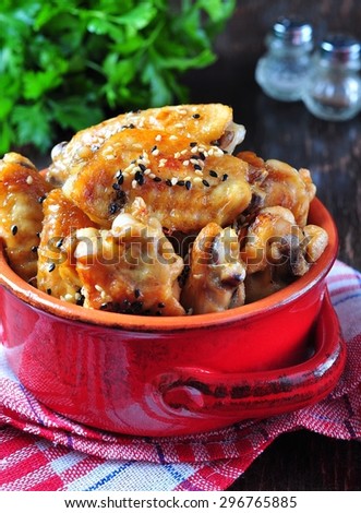 baked chicken wings in soy sauce with sesame seeds