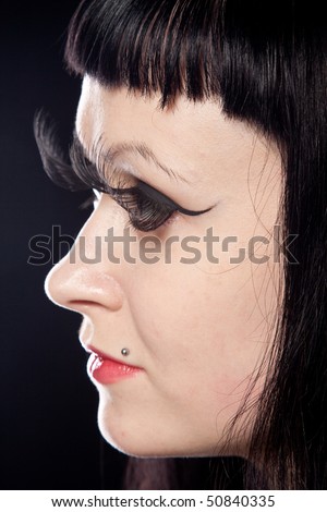 Pretty woman face with long eyelashes