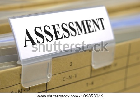 file folder marked with assessment
