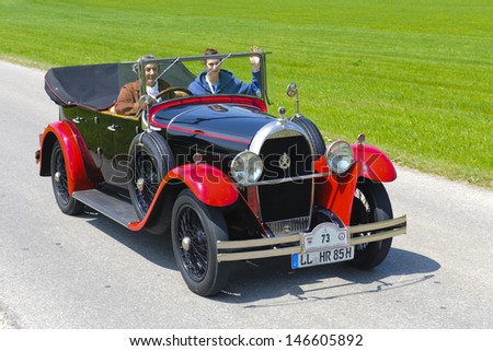 LANDSBERG, GERMANY - JULY 12: Oldtimer rallye for at least 80 years old antique cars with Hotchkiss AM 80 open Tourer, built at year 1928, photo taken on July 12, 2013 in Landsberg, Germany
