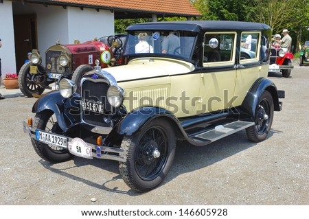 LANDSBERG, GERMANY - JULY 13: Oldtimer rallye for at least 80 years old antique cars with Ford A, built at year 1928, photo taken on July 13, 2013 in Landsberg, Germany