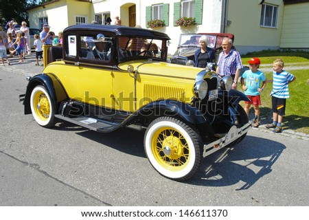 LANDSBERG, GERMANY - JULY 13: Oldtimer rallye for at least 80 years old antique cars with Ford A Coupe, built at year 1930, photo taken on July 13, 2013 in Landsberg, Germany