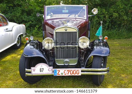 LANDSBERG, GERMANY - JULY 12: Oldtimer rallye for at least 80 years old antique cars with Wanderer W10 6-30 Cabriolet, built at year 1930, photo taken on July 12, 2013 in Landsberg, Germany