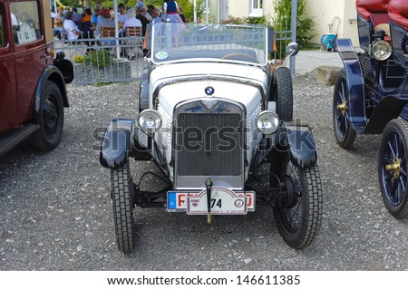 LANDSBERG, GERMANY - JULY 13: Oldtimer rallye for at least 80 years old antique cars with BMW Dixi DA 3 Cabriolet, built at year 1930, photo taken on July 13, 2013 in Landsberg, Germany