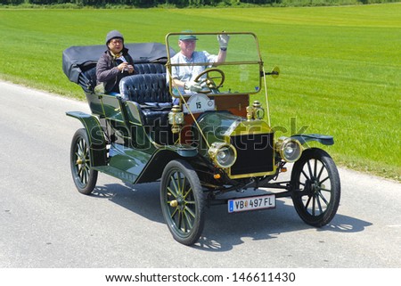 Landsberg, Germany - July 12: Oldtimer Rallye For At Least 80 Years Old Antique Cars With Ford T Touring, Built At Year 1910, Photo Taken On July 12, 2013 In Landsberg, Germany