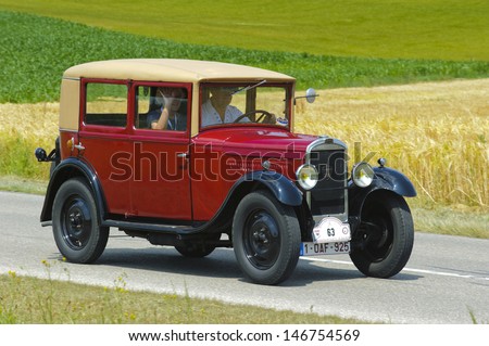 LANDSBERG, GERMANY - JULY 13: Oldtimer rallye for at least 80 years old antique cars with Peugeot 201 Berlin, built at year 1929, photo taken on July 13, 2013 in Landsberg, Germany