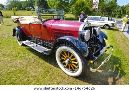 LANDSBERG, GERMANY - JULY 12: Oldtimer rallye for at least 80 years old antique cars with Cadillac V-63 Tourer Cabrio, built at year 1924, photo taken on July 12, 2013 in Landsberg, Germany