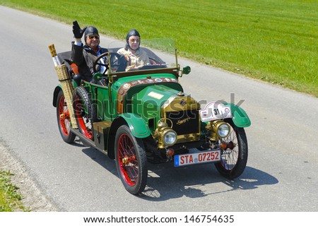 LANDSBERG, GERMANY - JULY 12: Oldtimer rallye for at least 80 years old antique cars with Swift Cycle Car, built at year 1914, photo taken on July 12, 2013 in Landsberg, Germany