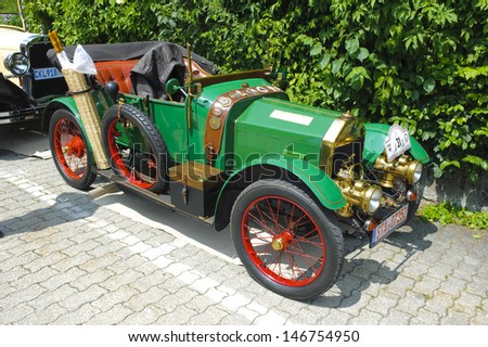 LANDSBERG, GERMANY - JULY 12: Oldtimer rallye for at least 80 years old antique cars with Swift Cycle Car, built at year 1914, photo taken on July 12, 2013 in Landsberg, Germany