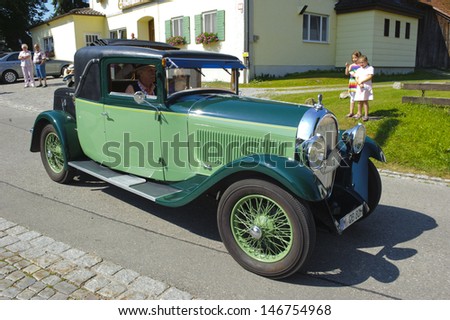 LANDSBERG, GERMANY - JULY 12: Oldtimer rallye for at least 80 years old antique cars with Hotchkiss Coupe Antibes, built at year 1930, photo taken on July 12, 2013 in Landsberg, Germany