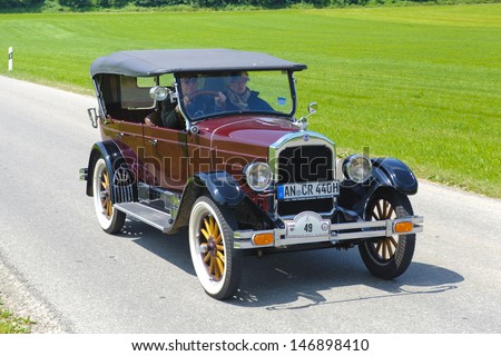 LANDSBERG, GERMANY - JULY 12: Oldtimer rallye for at least 80 years old antique cars with Durant Rugby R6 Tourer, built at year 1926, photo taken on July 12, 2013 in Landsberg, Germany