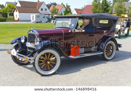 LANDSBERG, GERMANY - JULY 13: Oldtimer rallye for at least 80 years old antique cars with Durant Rugby R6 Tourer, built at year 1926, photo taken on July 13, 2013 in Landsberg, Germany
