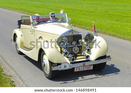 LANDSBERG, GERMANY - JULY 12: Oldtimer rallye for at least 80 years old antique cars with Rolls Royce 20 HP Cabriolet, built at year 1927, photo taken on July 12, 2013 in Landsberg, Germany