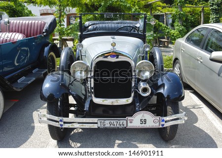 LANDSBERG, GERMANY - JULY 12: Oldtimer rallye for at least 80 years old antique cars with Ford A Phaeton, built at year 1929, photo taken on July 12, 2013 in Landsberg, Germany