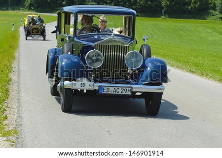 LANDSBERG, GERMANY - JULY 12: Oldtimer rallye for at least 80 years old antique cars with Rolls Royce Landaulet 20/25, built at year 1930, photo taken on July 12, 2013 in Landsberg, Germany