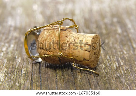 champagne cork after party on wooden table