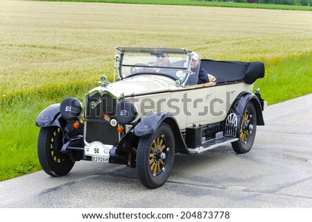 LANDSBERG, GERMANY - JULY 12, 2014: Public oldtimer rally organized by Bavarian city Landsberg for at least 80 years old veteran cars with unknown drivers in Buick Master Six, built at year 1926