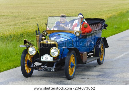 LANDSBERG, GERMANY - JULY 12, 2014: Public oldtimer rally organized by Bavarian city Landsberg for at least 80 years old veteran cars with unknown drivers in Delage B1 Tourer, built at year 1915