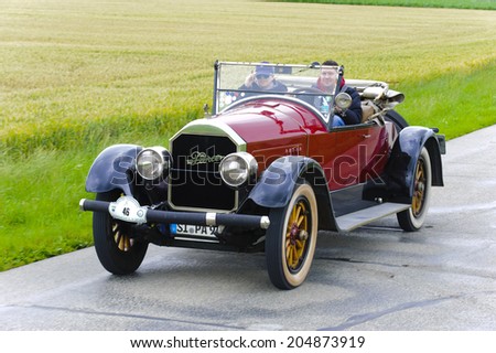 LANDSBERG, GERMANY - JULY 12, 2014: Public oldtimer rally organized by Bavarian city Landsberg for at least 80 years old veteran cars with unknown drivers in Pierce Arrow, built at year 1924