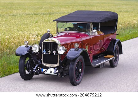 LANDSBERG, GERMANY - JULY 12, 2014: Public oldtimer rally organized by Bavarian city Landsberg for at least 80 years old veteran cars with unknown drivers in Sunbeam 25 HP, built at year 1926