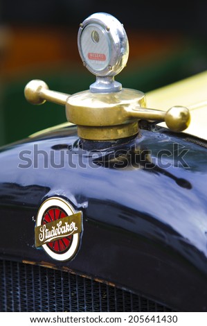 LANDSBERG, GERMANY - JULY 12, 2014: Public oldtimer rally in Bavarian city Landsberg for at least 80 years old veteran cars with a detail front view of Studebaker
