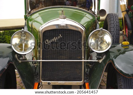 LANDSBERG, GERMANY - JULY 12, 2014: Public oldtimer rally in Bavarian city Landsberg for at least 80 years old veteran cars with a front view of Peugeot BL 177, built at year 1923