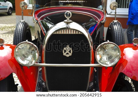 LANDSBERG, GERMANY - JULY 12, 2014: Public oldtimer rally in Bavarian city Landsberg for at least 80 years old veteran cars with a front view of Hotchkiss open Tourer, built at year 1928