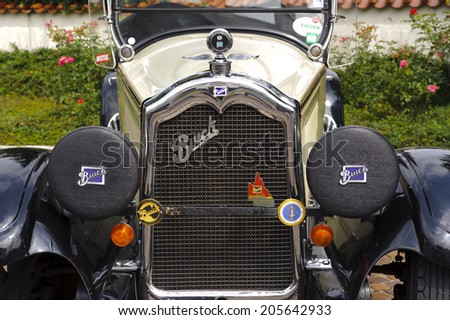 LANDSBERG, GERMANY - JULY 12, 2014: Public oldtimer rally in Bavarian city Landsberg for at least 80 years old veteran cars with a front view of Buick Master, built at year 1926